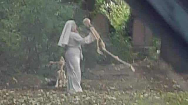 nurse with skeleton in graveyard viral people shocked 1631528168